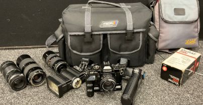 A Chinon CE-4S camera body; lenses, Vivitar, tamron; flash guns, camera bags; etc (qty)