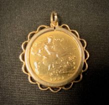 A George V sovereign, 9ct pendant mount, 1931, South Africa mint, 9.7g gross