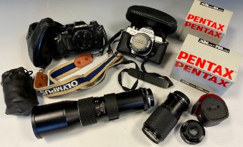 Cameras and camera equipment - a Pentax K1000 SLR camera, with SMC Pentax 35-80mm f/5.6 lens, and