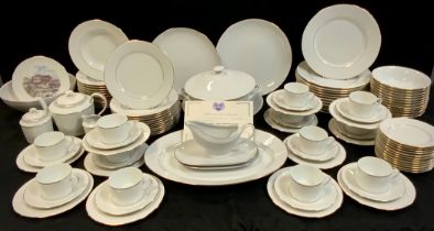 A extensive Limoges porcelain table service for twelve comprised of; twelve dinner plates, twelve