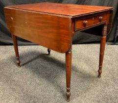 A 19th century mahogany Pembroke table, rounded rectangular top, single drawer to frieze, faux