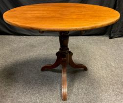 A 19th century mahogany tripod table, circular tilt-top, turned pedestal, 71.5cm high x 93cm