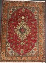 A North West Persian Tabriz Carpet, 300cm x 205cm.
