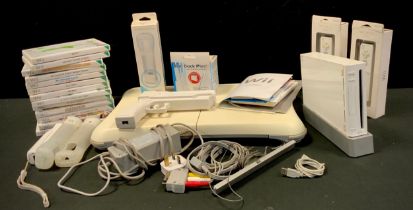 Nintendo wii Games console including; controller with motion plus accessory, wii fit board, games;