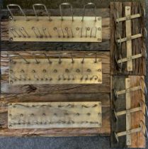 A pair of wall mounting three bottle wine racks; three other metal bottle/glass rack with drift wood