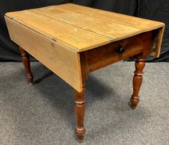 A 19th century rustic pine-top Pembroke style kitchen table, five-plank top, on a mahogany base with