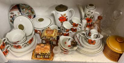 A Meakin poppy pattern part table service; Japanese Arita ware platter; cottage ware teapot and