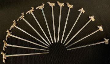 A set of seven silver cocktail sticks, fox terminals, Birmingham 1937/38, others Horse head (4).