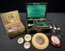 A Victorian tooled green leather jewellery box, containing a silver hinge bangle, silver plated