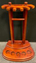 A mahogany snooker cue stand, 72cm high x 49cm wide.