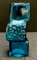 A Whitefrairs glass vessel ‘ Drunken brick layer’ in kingfisher blue, 20cm high