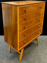An Alfred Cox style, mid century design walnut and beech chest of drawers, five long drawers,