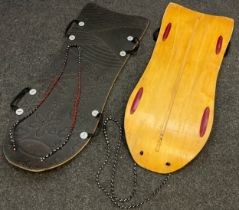 Two Snow Sleds / Ski boards, formed plywood boards, each measuring 116.5cm x 45cm, (2).