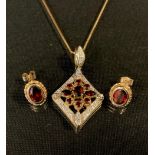 A diamond and garnet pendant necklace and earring suite, 9ct gold mounts, stamped 375, 4.6g gross