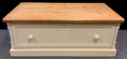 A large oak and pine single drawer chest / coffee table, the base painted white, (converted from the