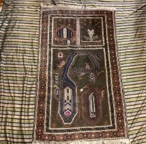 A hand knotted Middle Eastern, possibly Afghan rug, 82cm x 142cm; other throw or drape (2)