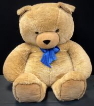 A very large Simply toys teddy bear, blue bowtie, approx 125cm high