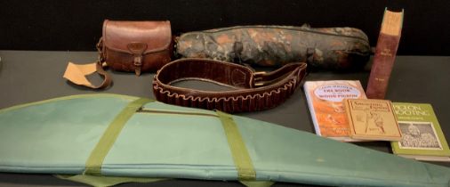 A George Bussey leather cartridge bag, 50 capacity, signed, initialed; rifle bag, Instruction to