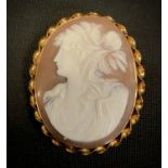 A Victorian style oval cameo brooch, as a maiden, 9ct gold mount, 54mm x 43mm, 14.5g gross