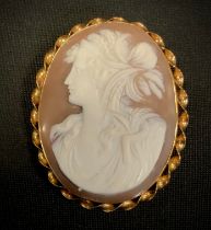 A Victorian style oval cameo brooch, as a maiden, 9ct gold mount, 54mm x 43mm, 14.5g gross
