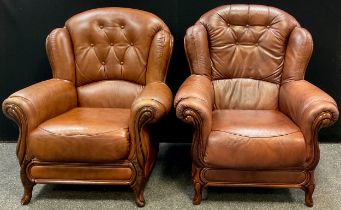 A pair of tan leatherette button-back armchairs, 100cm high x 89cm wide, (2).