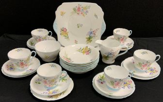A Shelley ‘Wildflowers’ pattern tea set for six including two picnic plates, six tea cups and