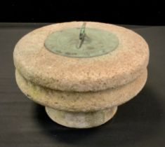 A reconstituted stone sun dial, 22cm dia