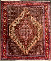 A North West Persian Senneh rug, 160cm x 130cm.
