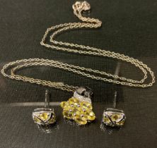 A diamond and yellow beryl pendant and earring suite, 9ct white gold mounts, stamped 375, 4.1g
