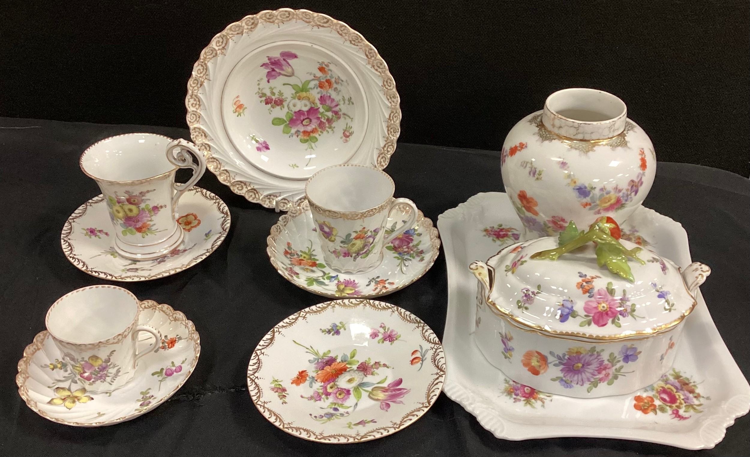 Dresden moulded swirl bowl, 18.5cm dia, tea cups and saucers, lidded box decorated with hand painted