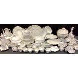 A quantity of 20th century white table-ware, including tea cups, plates, tureens; etc