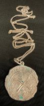 A Phillip III (1555-1621) silver 8 Reales coin pendant necklace, probably a later copy/replica,