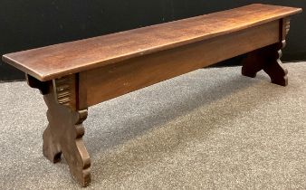 A 19th century style oak chest bench, single oak plank hinged seat, lifting to coffer compartment,