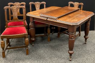 A Victorian extending walnut dining table, canted square top, extending to rectangle with addition
