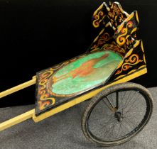 A bespoke-made painted cart, 131cm high x 231cm long x 81cm wide.