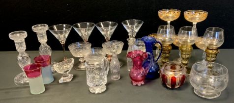 Glass - A set of four Edwardian champagne coupes,c.1905, pair of of cut glass candlesticks, 20cm