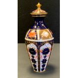 A Royal Crown Derby 1128 Imari pattern urn and cover, rounded hexagonal base, date code for 1920,