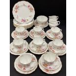 A Royal Crown Derby part tea service for eight including eight tea cups and saucers , milk jugs; etc