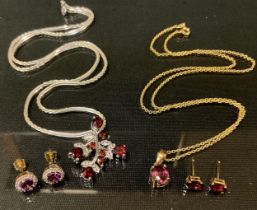 A pale pink ruby pendant necklace and earring suite, possibly Burmese (Myanmar) 9ct gold mounts,