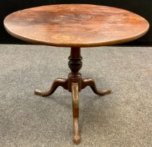 A 19th century mahogany tilt-top centre table, turned support, tripod base, 69cm high x 84.5cm