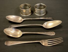 Silver - A George III silver table spoon, London, 1804, silver napkin rings; etc, 152.0g in total