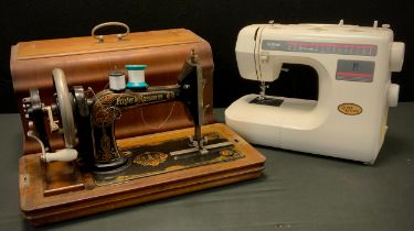 A vintage Frister & Rossmann hand operated sewing machine, 3765480 , cased ; another later Brother