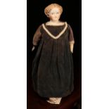A 19th century unglazed Parian type shoulder head doll, the unglazed Parian type shoulder head