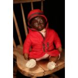 An early 20th century Horsman 'Baby Bumps' painted composition head black doll, the painted