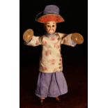A bisque head novelty 'automaton' type doll, in the form of a Chinese musician, the bisque head with