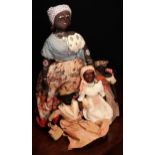 Folk Art - an early 20th century black cloth rag doll, probably produced in Bahia (Brazil), the