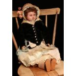 A late 19th century poured wax shoulder head doll, unmarked but attributed to Pierotti, the slightly