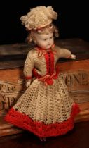 A 19th century unglazed Parian type shoulder head doll, the unglazed Parian type head with painted