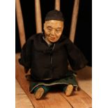 An early 20th century Chinese Door of Hope Mission 'Uncle' doll, the painted papier-mâché head