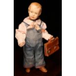 An early 20th century Schoenhut carved and painted wooden character doll, the carved and painted